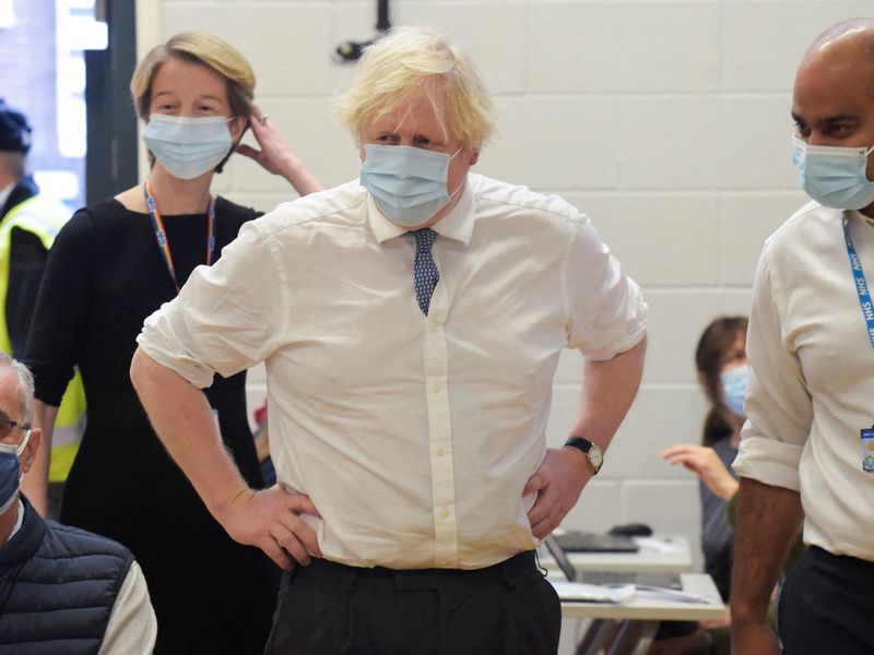 British Prime Minister Boris Johnson visits a vaccination centre in