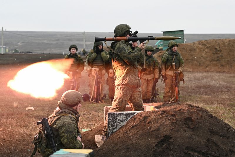 FILE PHOTO: Russian service members hold drills in the Rostov