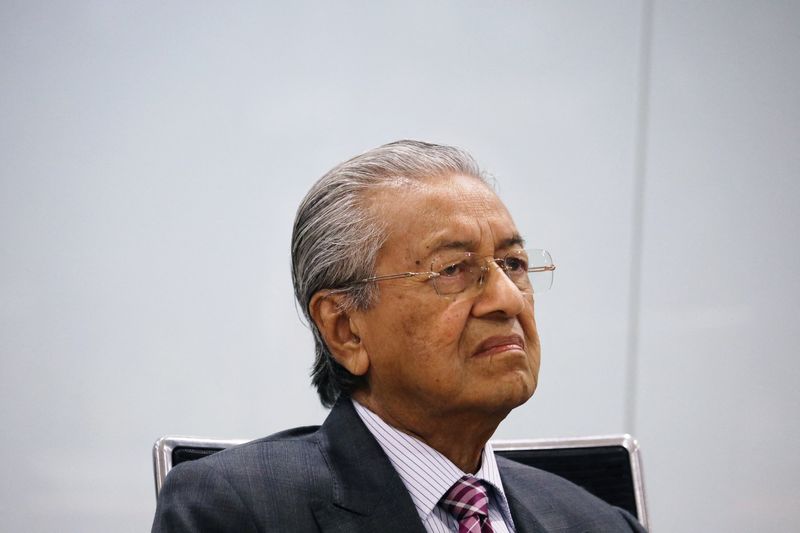 Malaysia’s former Prime Minister Mahathir Mohamad attends a news conference