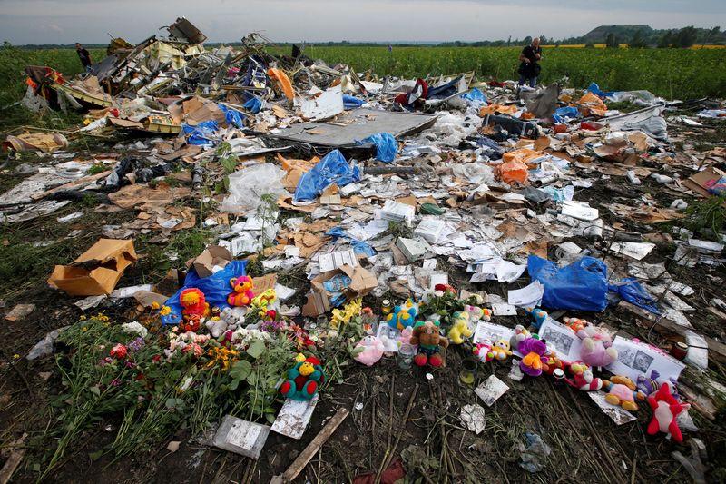 FILE PHOTO: Flowers and mementos left by local residents at