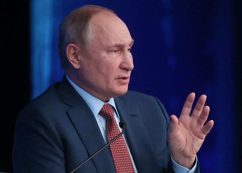 Russian President Vladimir Putin attends a convention of the Russian