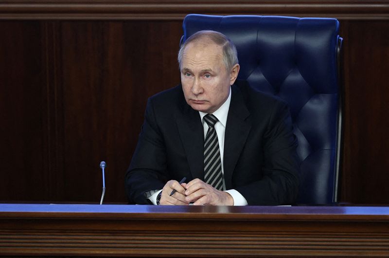 Russian President Putin attends a meeting of the Defence Ministry