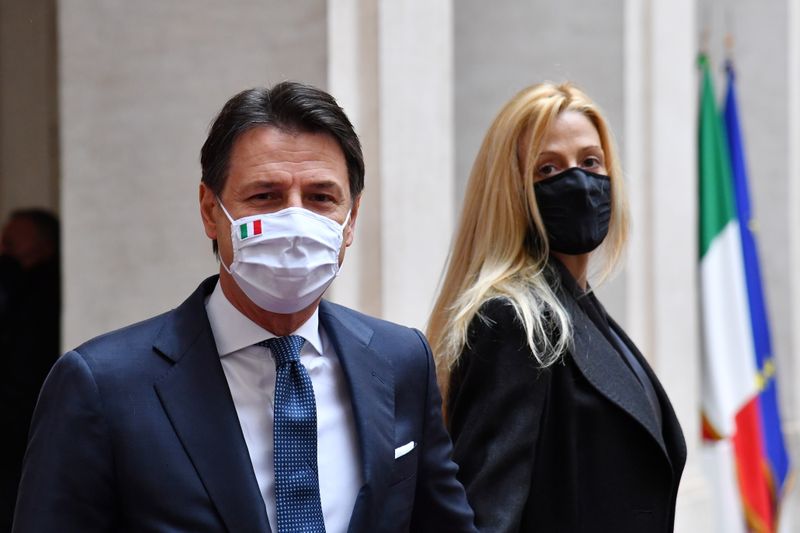 Italy’s outgoing Prime Minister, Giuseppe Conte and his companion Olivia