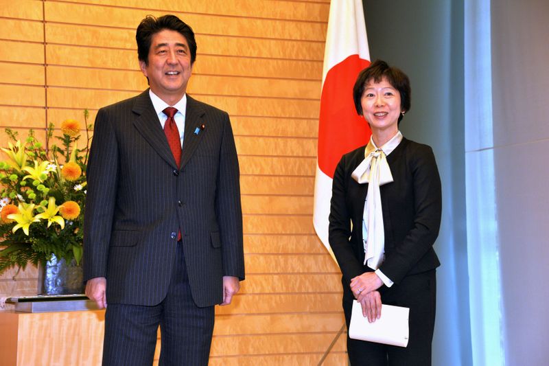 FILE PHOTO: Makiko Yamada and Japan Prime Minister Yoshihide Suga’s