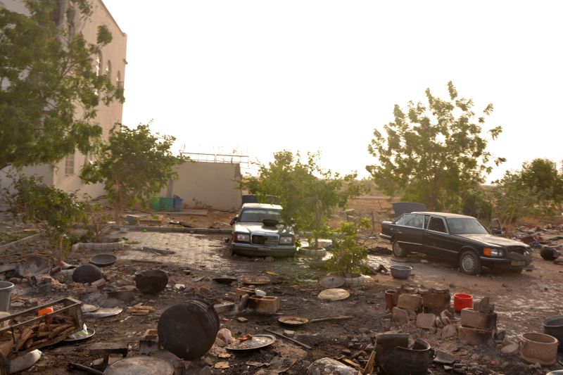 FILE PHOTO: Debris is scattered in front of a building