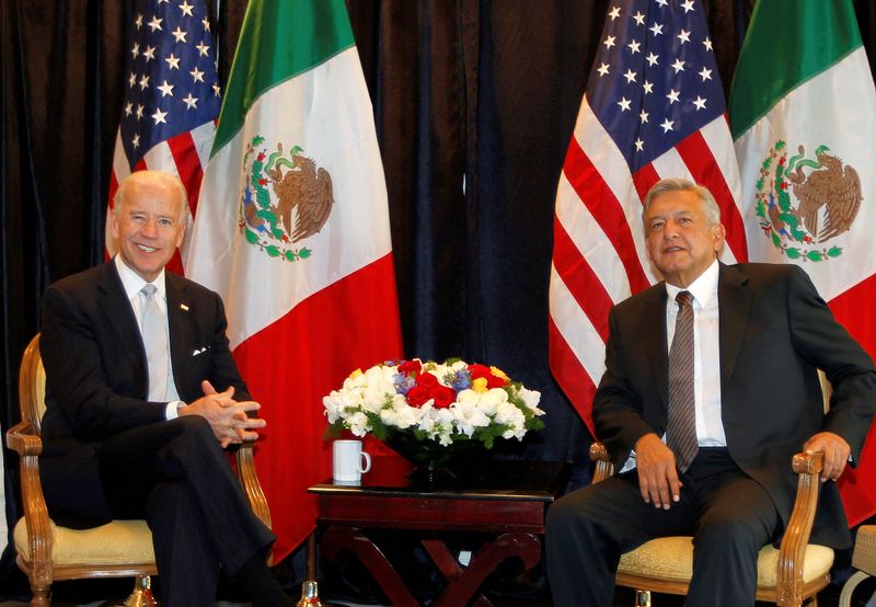 FILE PHOTO: Then-U.S. vice president Joe Biden (L) with Andres