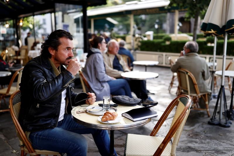 French cafes reopen their terraces to customers in Paris