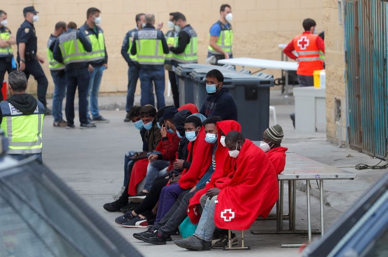 Thousands of migrants cross the Spanish-Moroccan border in Ceuta