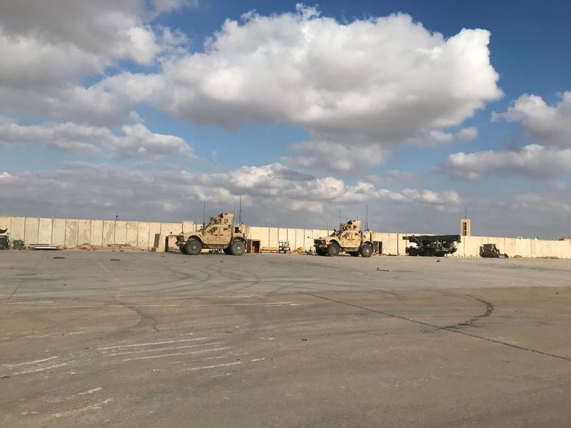 Military vehicles of U.S. soldiers are seen at Ain al-Asad