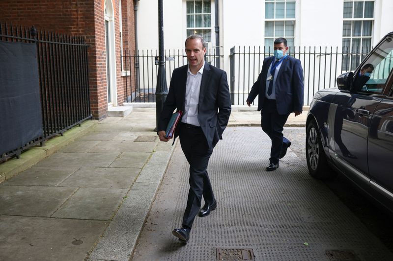 Britain’s Foreign Secretary Dominic Raab walks on Downing Street