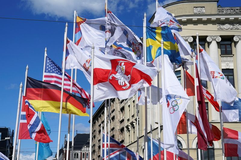 Historical white-red-white flag of Belarus flies in Riga