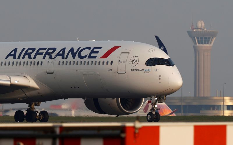 FILE PHOTO: An Air France airplane lands at the Charles-de-Gaulle