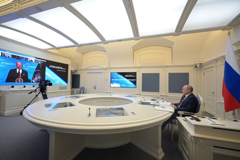Russian President Vladimir Putin attends a virtual global climate summit