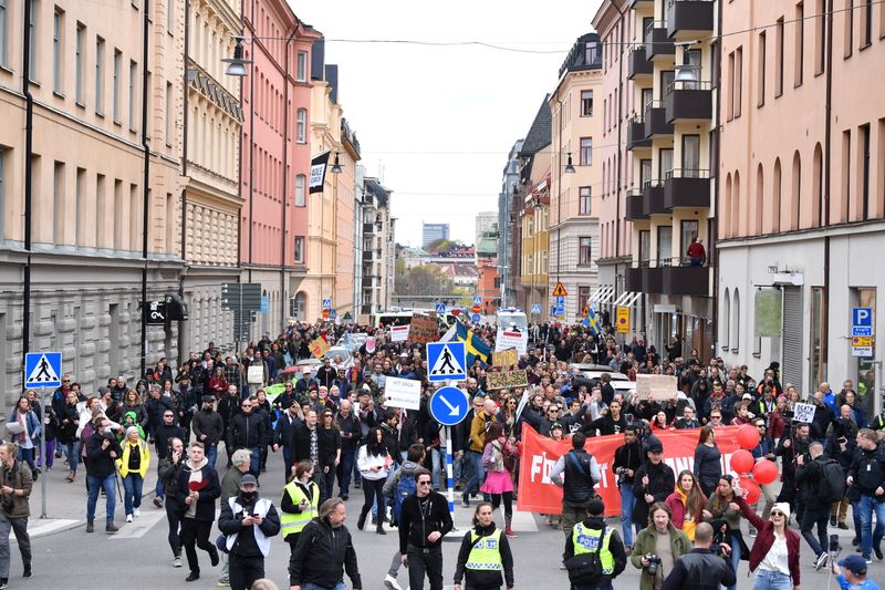 FILE PHOTO: Protestors from Frihet Sverige march to protest against
