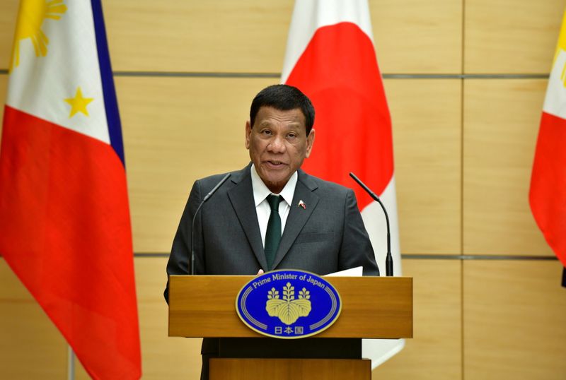 FILE PHOTO: Philippine President Rodrigo Duterte delivers a speech during