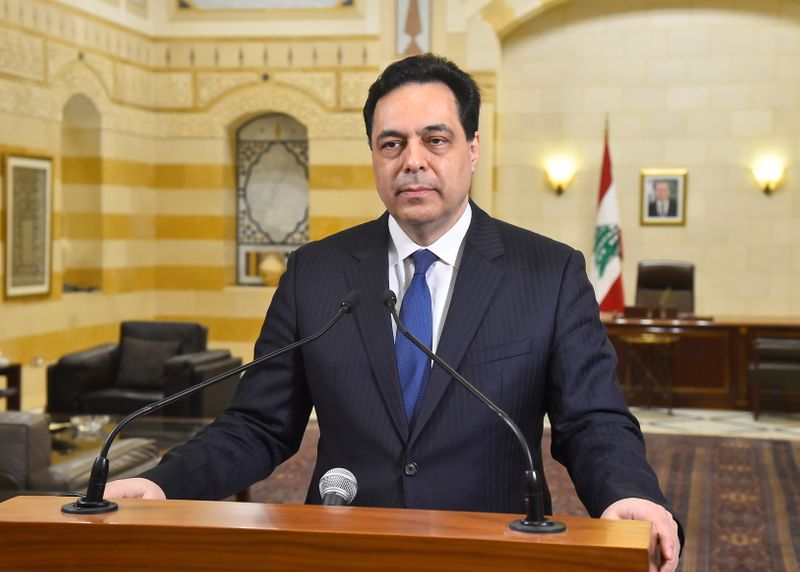 Lebanon’s caretaker Prime Minister Hassan Diab speaks at the government