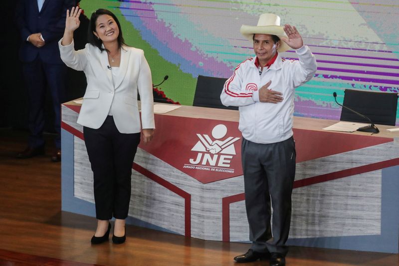 FILE PHOTO: Peru’s presidential candidates Castillo and Fujimori in their