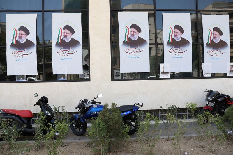 FILE PHOTO: Posters of presidential candidate Ebrahim Raisi are seen