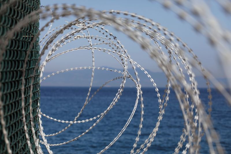 FILE PHOTO: The border fence separating Spain’s northern enclave Ceuta
