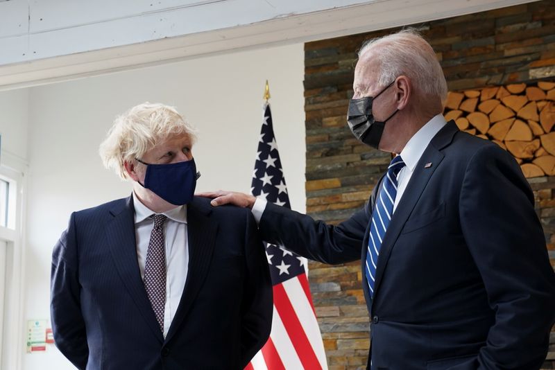 Britain’s PM Johnson and U.S. President Biden meet ahead of
