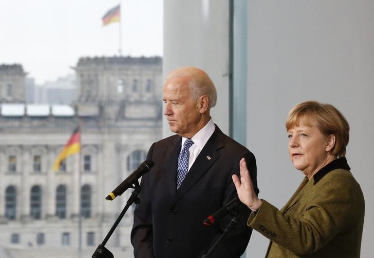 FILE PHOTO: German Chancellor Merkel and U.S. Vice President Biden