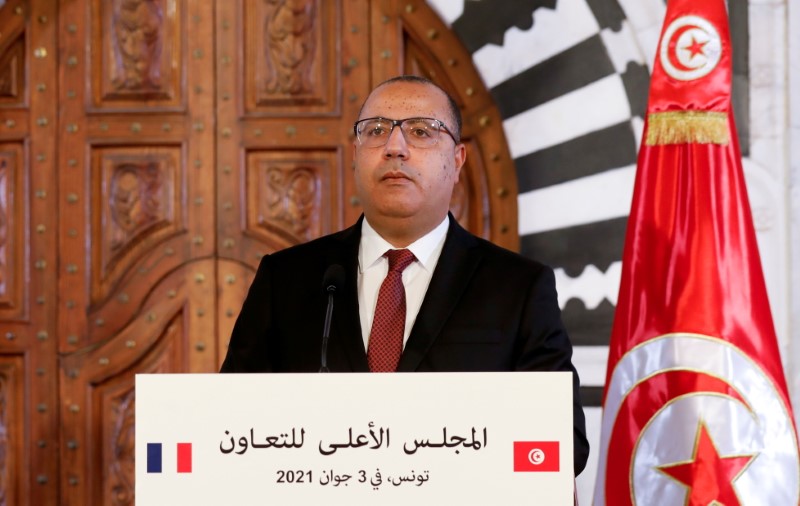 FILE PHOTO: Tunisian prime minister appears in news conference