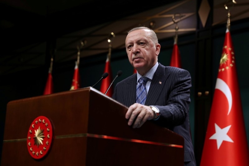 FILE PHOTO: Turkish President Tayyip Erdogan gives a statement after