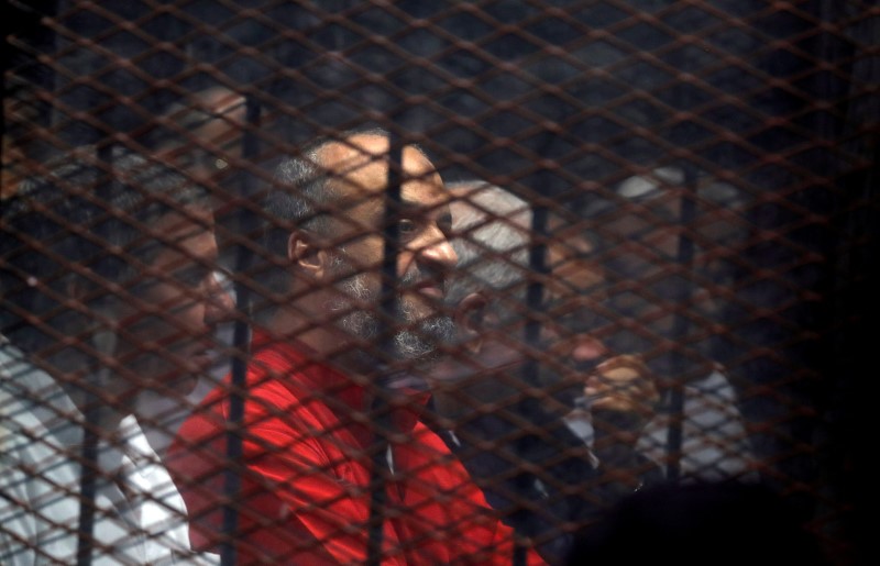FILE PHOTO: Muslim Brotherhood’s senior member Mohamed El-Beltagi sits behind