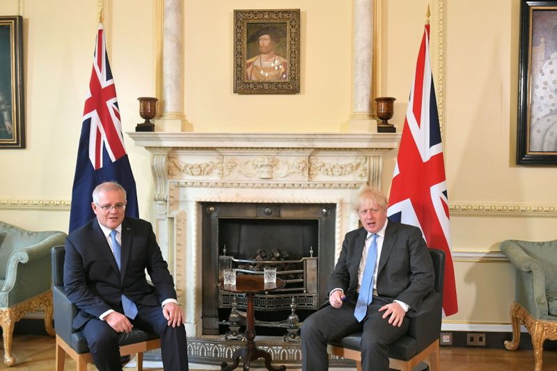 Britain’s PM Johnson and Australia’s PM Morrison meet ahead of