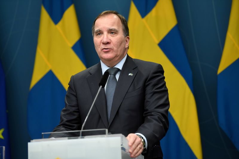 FILE PHOTO: Swedish Prime Minister Stefan Lofven holds a news