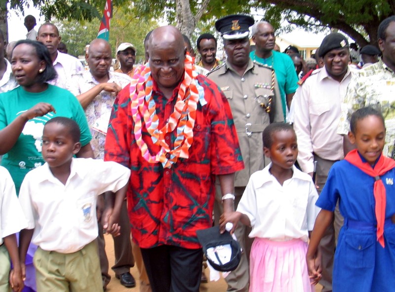 FILE PHOTO: Former Zambian president Kaunda walks with children in