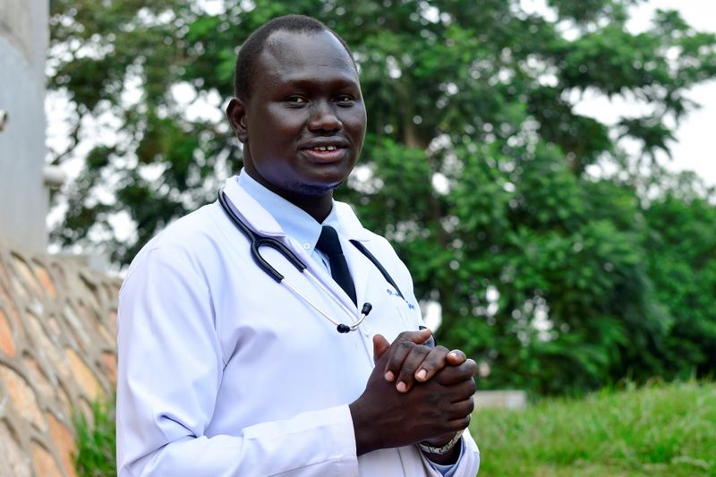 Trainee doctor who fled from South Sudan to Uganda poses