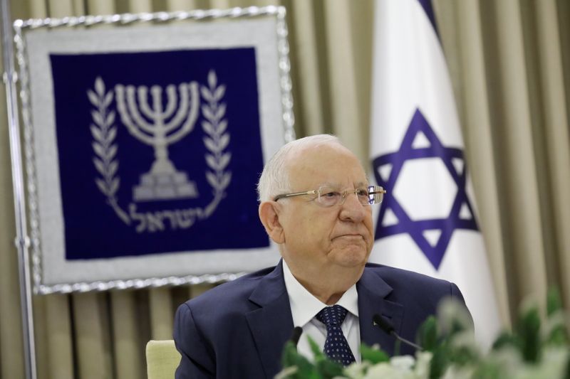 Israeli President Reuven Rivlin looks on during consultations with party