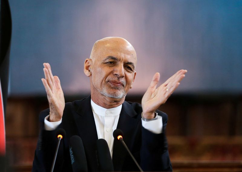FILE PHOTO: Afghanistan’s President Ashraf Ghani gestures during celebrations to