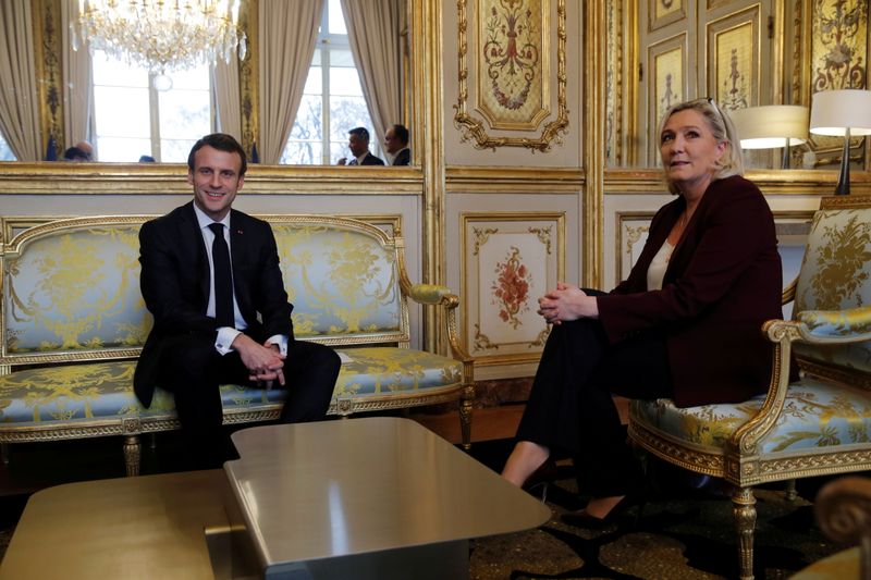FILE PHOTO: French President Emmanuel Macron attends a meeting with
