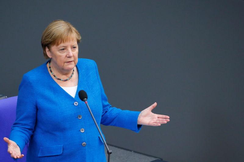 German Chancellor Angela Merkel attends the last session of the