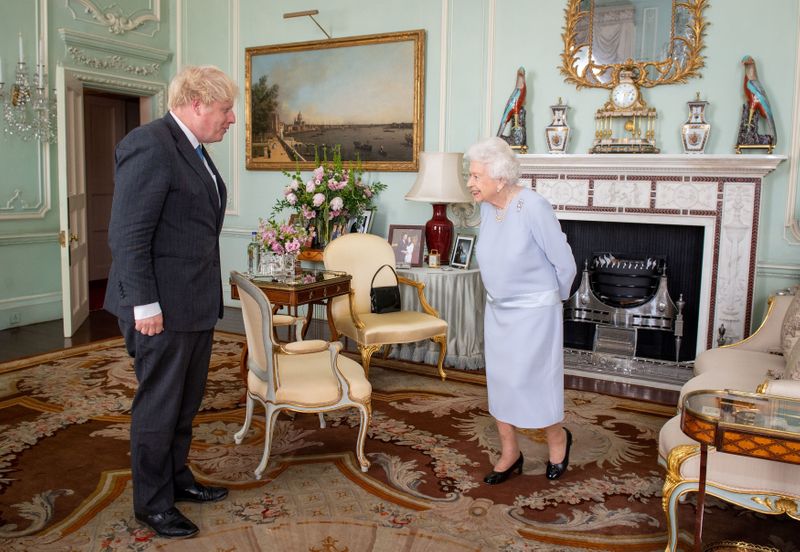Britain’s Queen Elizabeth II meets PM Johnson at Buckingham Palace