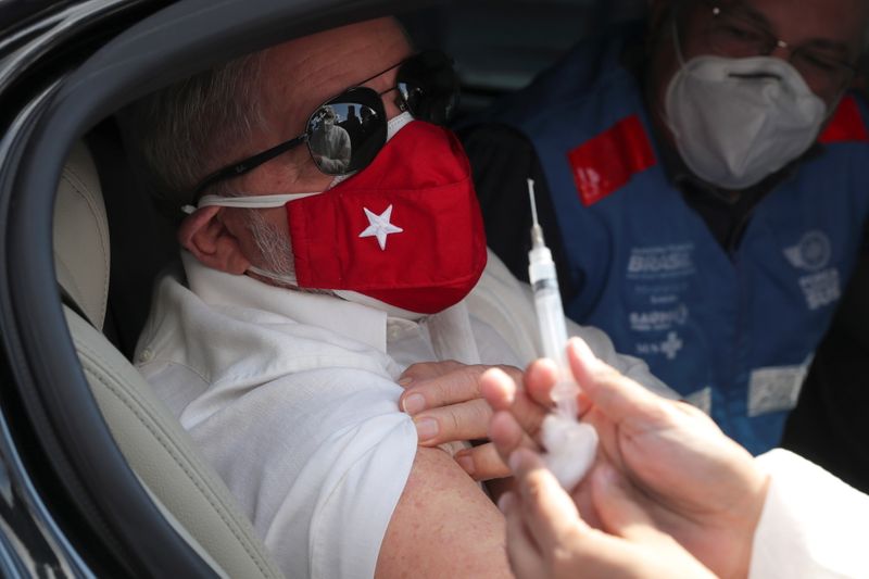 FILE PHOTO: Former Brazilian President Lula receives COVID-19 vaccine near