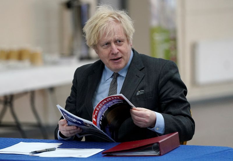 FILE PHOTO: Boris Johnson visits vaccination centre in Batley