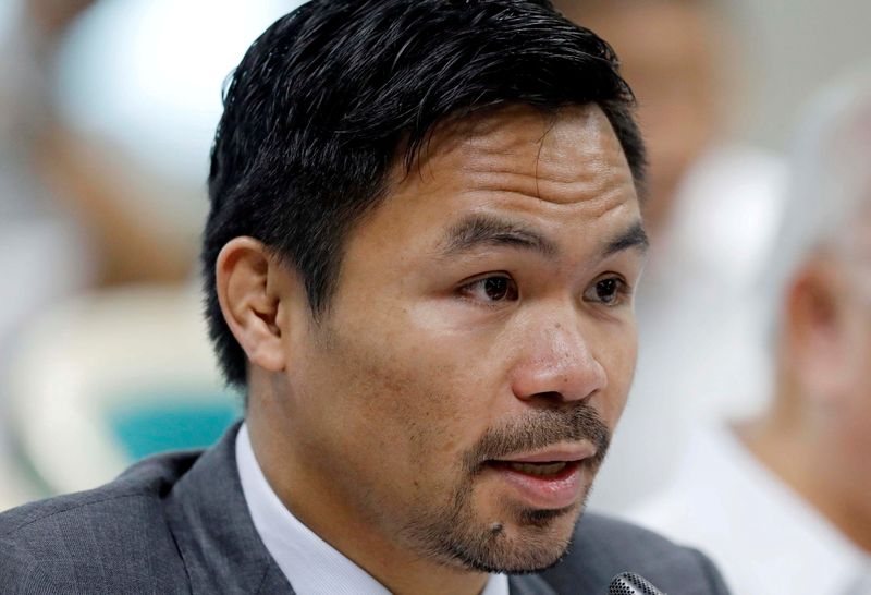 FILE PHOTO: Philippine Senator and boxer Manny Pacquiao speaks during