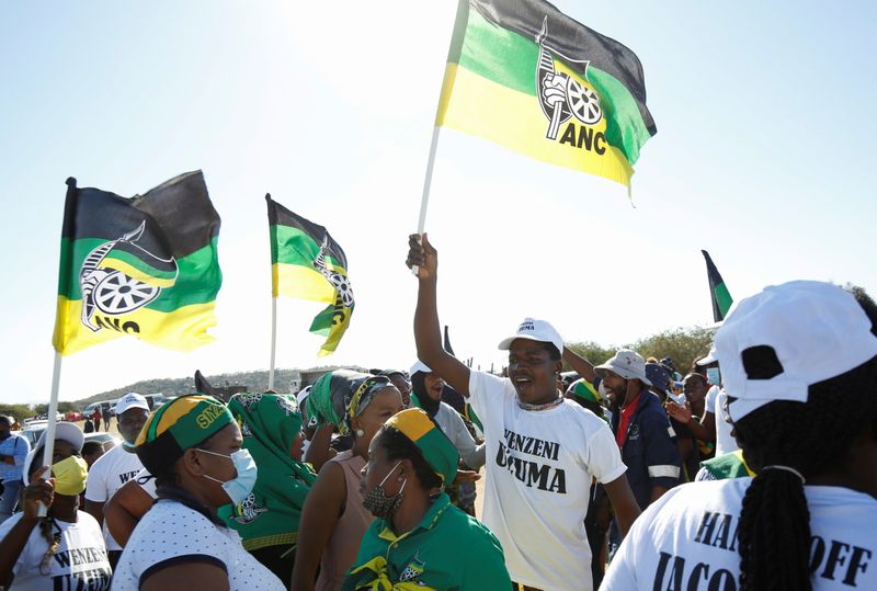 Supporters of former South African President Jacob Zuma sing and