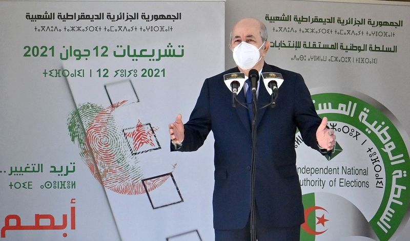 FILE PHOTO: Algeria’s President Abdelmadjid Tebboune speaks outside a polling