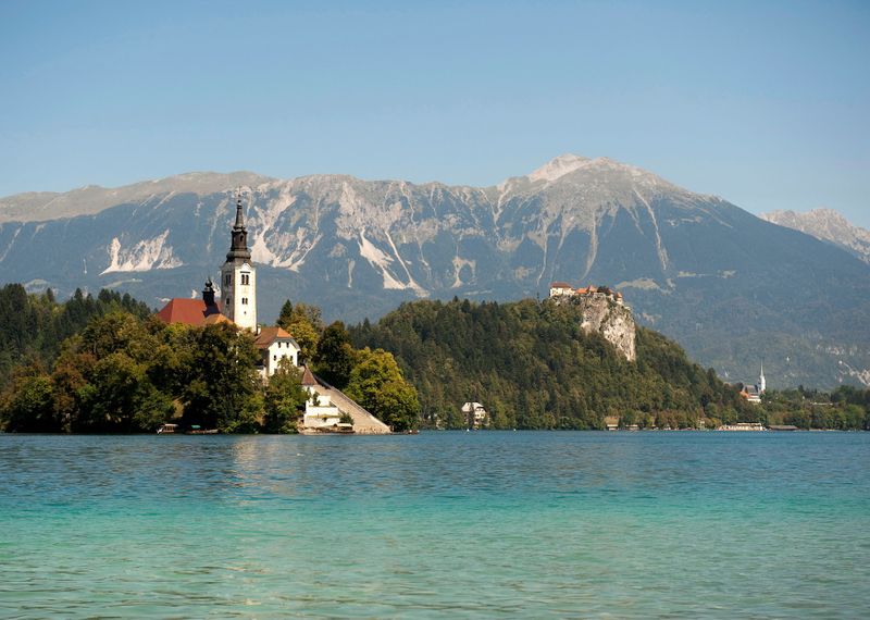 FILE PHOTO: A church and a castle beside Lake Bled