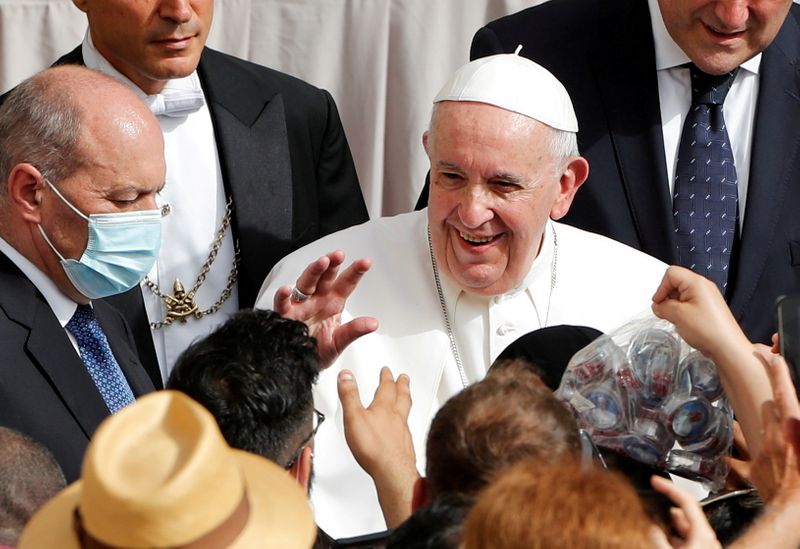 FILE PHOTO: Pope Francis arrives to hold weekly general audience
