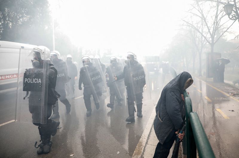 Protesters attack the headquarters of the Democratic Party in Tirana