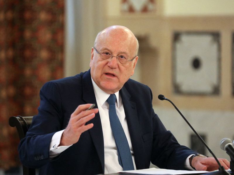 Lebanese Prime Minister Najib Mikati gestures during a news conference