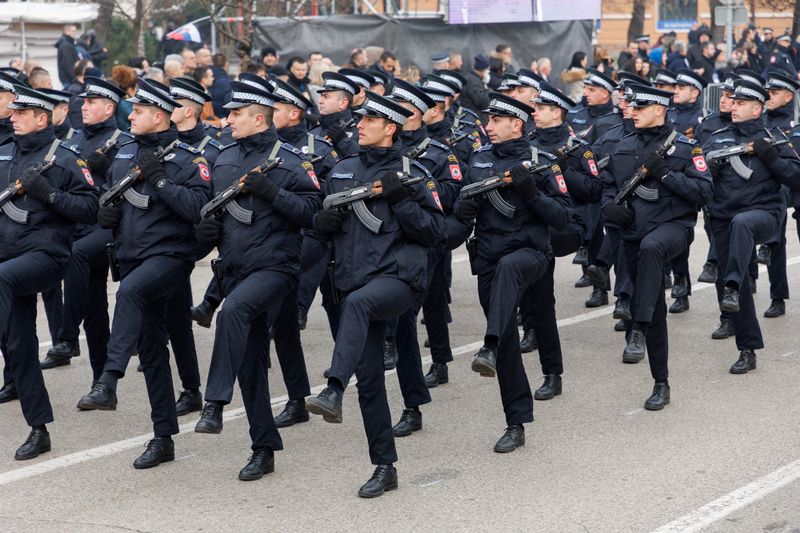 FILE PHOTO: Police march during parade celebrations to mark their