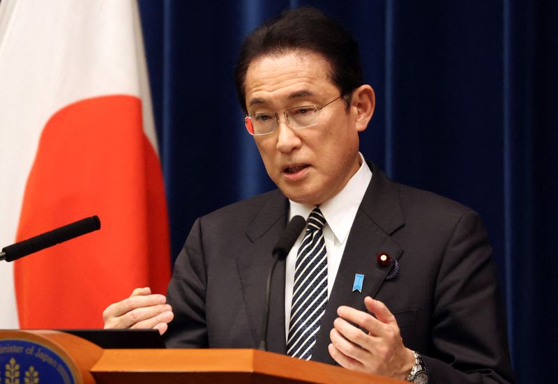 Japanese Prime Minister Fumio Kishida speaks before the media at