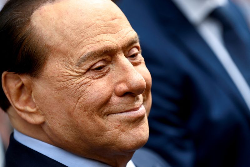FILE PHOTO: Italy’s former prime minister, Silvio Berlusconi, reacts after