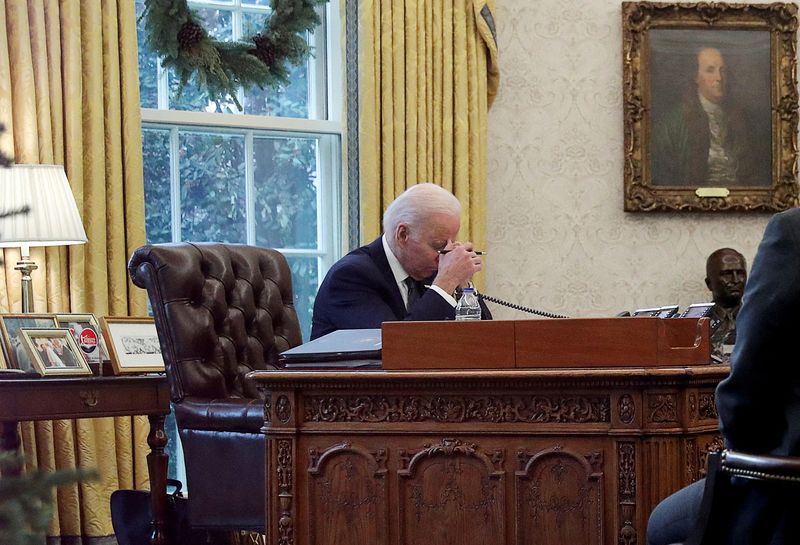 FILE PHOTO: U.S. President Joe Biden speaks by phone with